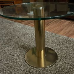 Glass and brass round end table