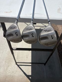 Left handed driver and woods