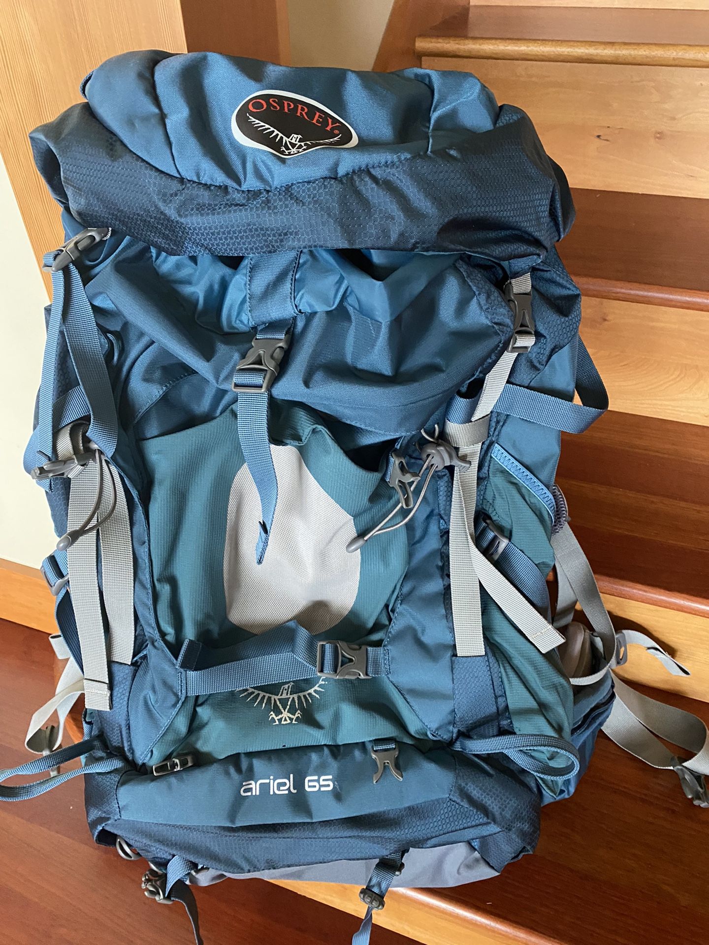 Osprey Ariel 65 + Travel pack + Rain poncho