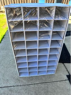 Shoe holder with plastic cover