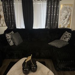Ashley’s Large Black Sofa 