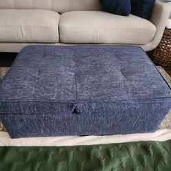 Blue ottoman that converts into lounger-like new