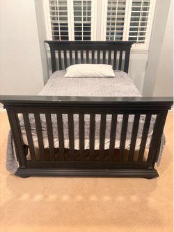 Navy blue full size bed frame and six drawer dresser