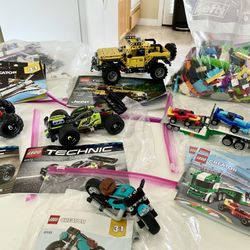 Lego Sets Prebuilt With All The Manuals- No Boxes.  Large Bag Of Assorted Lego Pieces.  Not Selling Individually. Price Is FIRM
