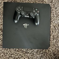 PS4 Pro 1TB  W/ controller 
