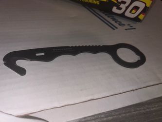 Benchmade Parachute cutter tool with holster
