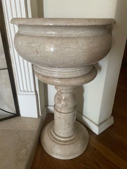 Marble pedestal with urn