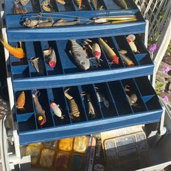Flambeau Tackle Box full of lures plus Three Reels and Rods (Daiwa & Quantum Reels).