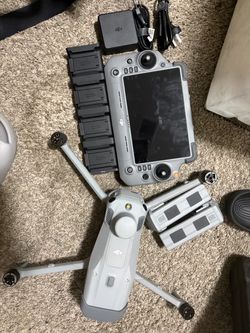 DJI Drone with RC Controller and Batteries