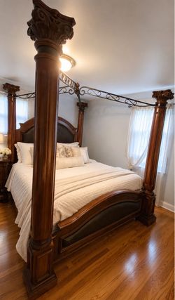 $600 Ashley King Canopy Bed