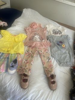 2 OUTFITS AND 2 ADORABLE ONSIES SIZE 12 MONTHS. NEVER BEEN WORN
