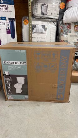 Glacier Bay 10 in. Rough In 2-Piece 1.28 GPF Single Flush Elongated Toilet in White, Seat Included. Our price $150