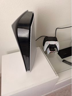 PS5 With two controllers and charging pad