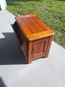 Wooden end table. I dont think you can find many like. Mine
