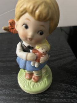 Girl With Doll Statue