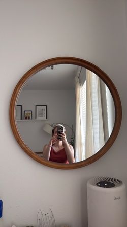 Round natural brown bohemian bedroom mirror