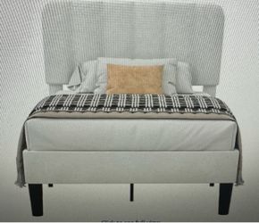 Twin size bed frame with upholstered headboard