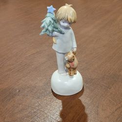 Vintage Enesco O Tannenbaum Music box porcelain figurine Made in Japan 
boy holding teddy bear and christmas tree.  8.5"  tall. Made in Japan. 
