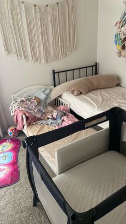 Toddler bed with waterproof mattress, and twin size bed frame