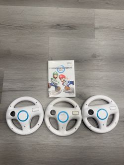 Brand new Mario kart Wii disc with used wheels