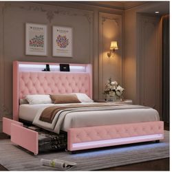 Full size pink velvet bedframe with four storage drawers and charge station pink velvet