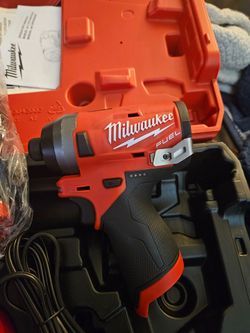 Milwaukee M12  Fuel 1/4" Impact Driver Slightly Used  And New  Sub Compact M12  3/8" Drill