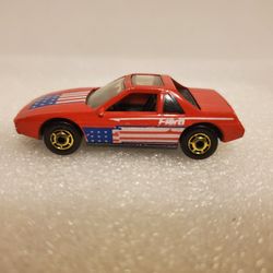 1984 Mattel Hot Wheels The Hot Ones Red Fiero 2M4 Flag on Hood, Gold Rims 