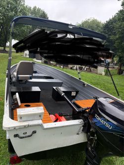 1992 Crestliner 14’ with load rite trailer and 9.8 tohatsu