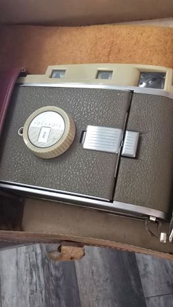 Vintage Polaroid camera and case
