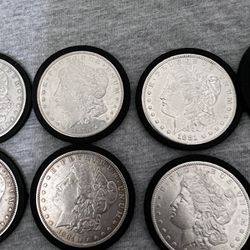 16 Morgan Silver Dollars