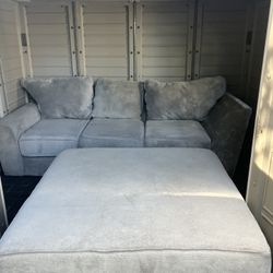 Couch loveseat with  huge ottoman 