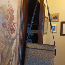 Beautiful Brown And Deep Beige Coach Purse. Approximately 10 Inches Tall By 11 Inches Wide. New! Never Used. 