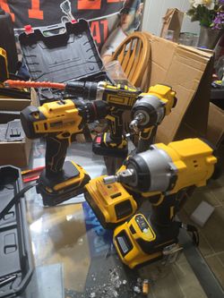 4 drills,hammer drill,drill/driver drill,2 impacts 1×450nm ,1×600nm both metal hooks brand new 4 batterys impacts are dewalt compatable to be used wit