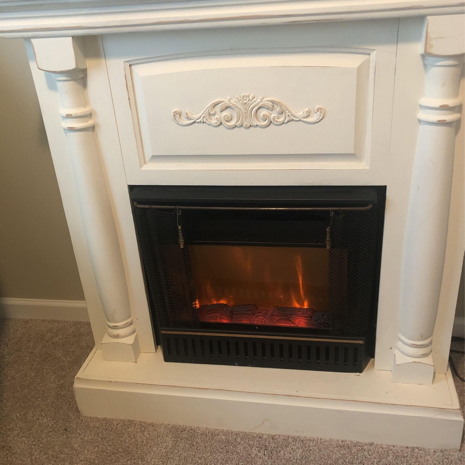 Beautiful Fireplace Surround With Electric Insert.