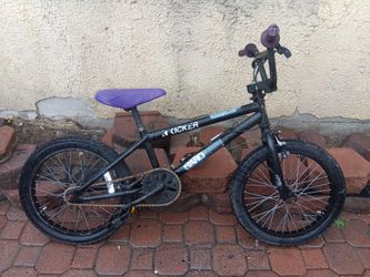 Kids black hair freestyle bmx bike