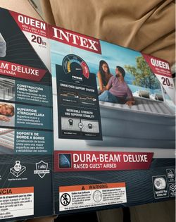 Inflatable mattress with built in pump