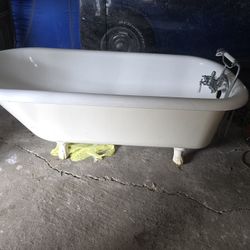 Antique claw foot cast iorn porcelain refinished with Antique style faucet