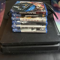 Pre Owned playstation 4 Slim With Games