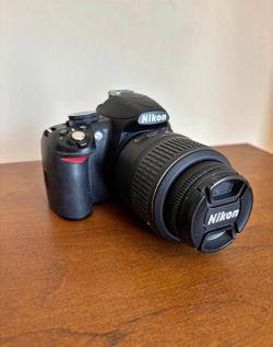 Nikon D3100 digital camera with 18.55mm