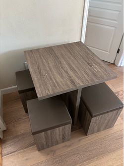 Table and 4 storage ottoman seats, dining set
