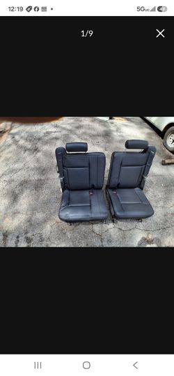 Vehicle Model: 2003–2007 Hummer H2
​Item: Rear 3rd Row Seats (Split-Folding Setup / Left and Right Sides)
​Color/Material: Dark Gray / Black Leather .