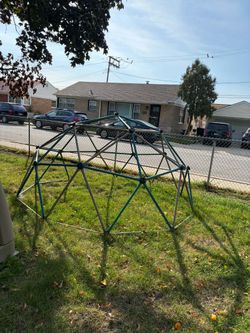 Kids climbing geometric dome