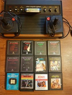 Atari Video Console with two Joysticks and 13 Video Game Cartridges CX2600 Circa 1978 Great Conversation Memorabilia Item Great Conditions