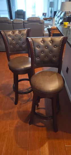Set of leather and wood bar stools