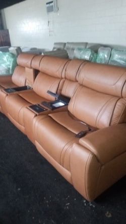 Cognac reclining sectional with built-in cooler, charging stations, heat and massage