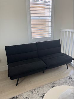Hardly used/New pillow top Futon