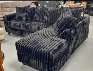 Brand new black velvet sofa