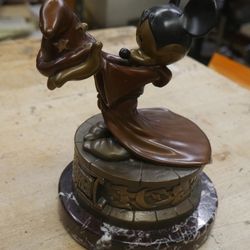 Mickey Mouse "The Sorcerer's Apprentice" Limited Edition Bronze Statue Bill Toma. 55/100. 7.5 inches long . 5.5 inches wide.  