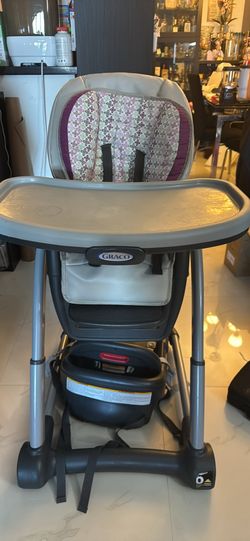 Graco adjustable high chair on wheels with booster
