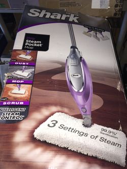 Shark steamer in box comes w three heads and pads